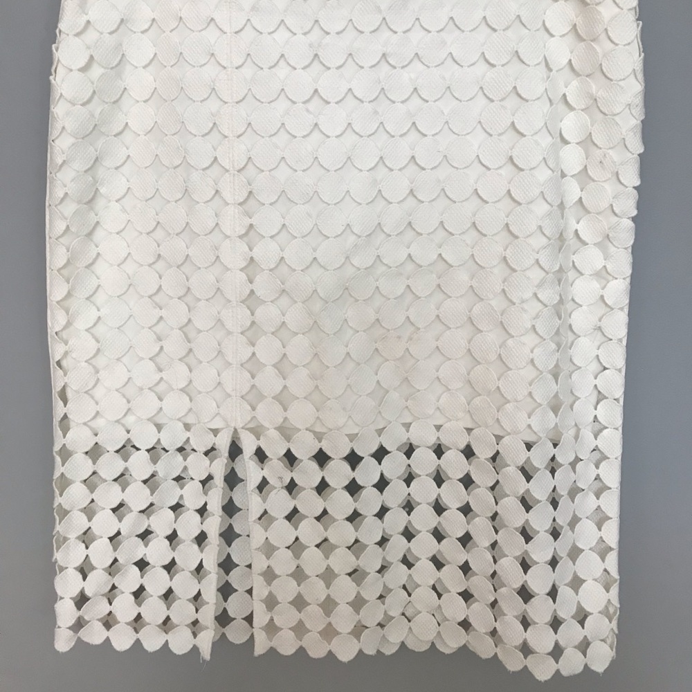 Knee length white peak-a-boo skirt